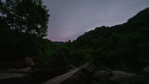 Dramatic Dark Clouds Moving Over Valley Night Time-lapse Stock Footage 326670837