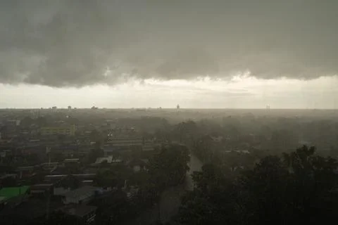 Dramatic dark clouds sky with thunder storm and rain. Abstract nature landsca Stock Photos