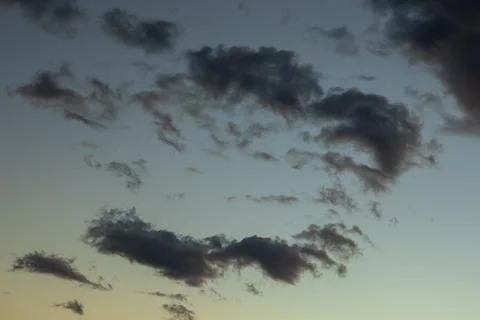 Dramatic Dark Clouds at Sunset Stock Photos