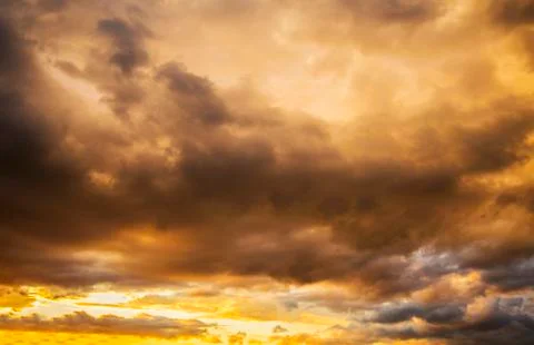 Dramatic Dark cloudy stormy sky in the evening Stock Photos