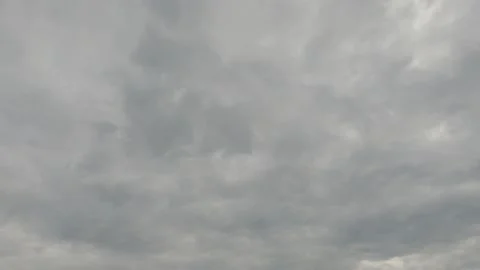 Dramatic dark gray cloud n puffy fluffy white cloudscape Stock Footage 146738795