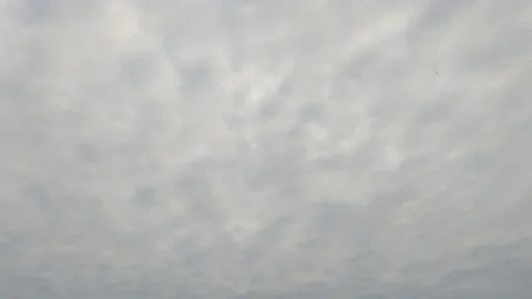 Dramatic dark gray cloud n puffy fluffy white cloudscape Stock Footage 146827966