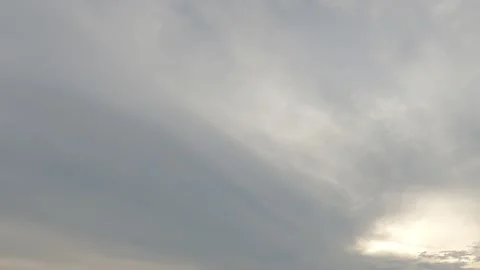 Dramatic dark gray cloud on sunrise or sunset sky in tropical summer sunlight Video stock 146735981