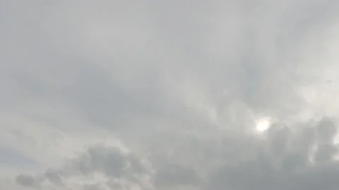 Dramatic dark gray cloud on sunrise or sunset sky in tropical summer sun rays Stock-Footage 146736080