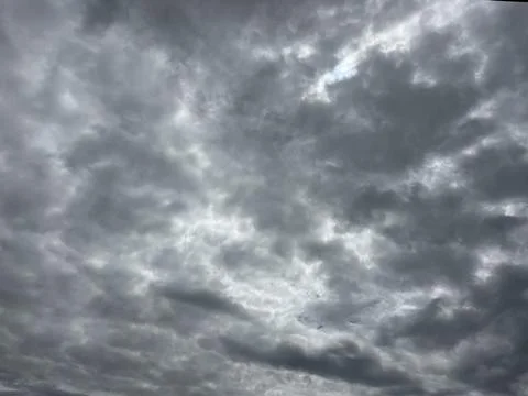 Dramatic Dark Storm Clouds and Moody Grey Sky Before Rain Stock Photos
