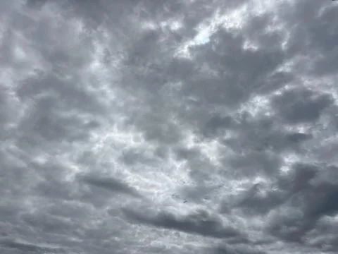 Dramatic Dark Storm Clouds and Moody Grey Sky Before Rain Stock Photos