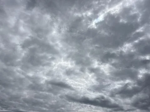 Dramatic Dark Storm Clouds and Moody Grey Sky Before Rain Stock Photos