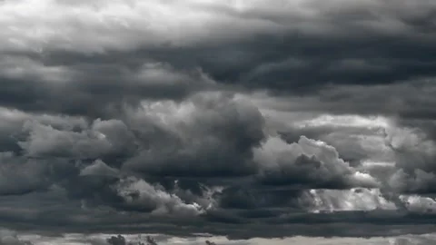 Dramatic dark storm clouds background timelapse of nature showing heavy grey sky Stock Footage 347718610