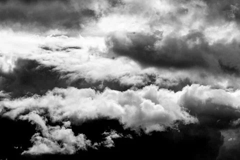 Dramatic dark storm clouds black and white photo Stock-Fotos