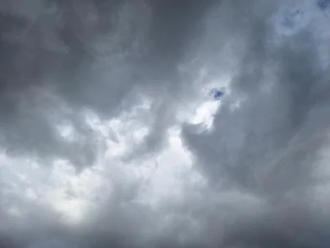 Dramatic Dark Storm Clouds Covering the Sky Stock Photos