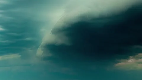 Dramatic dark storm clouds gathering in the sky before heavy rain Vídeos de archivo 331415182