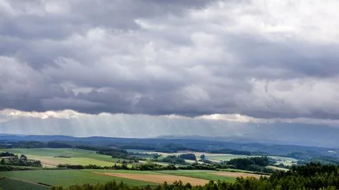 Dramatic Dark Storm Clouds Loom Over Cliffside City Before Rains Photo Stock Photos