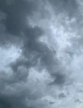 Dramatic Dark Storm Clouds Moving Across the Sky Stock Photos