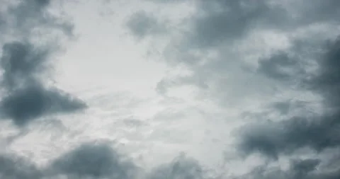 Dramatic dark storm thundercloud rain clouds on black sky background. Dark thund Stock Footage 247596696