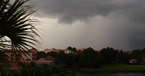 A Dramatic Day at Resort thunderstorm dark clouds over resort ready timelapse Stock Footage 242056189