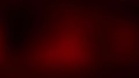 Dramatic deep red light flares dynamically bloom across dark mysterious Stock Footage 317131879