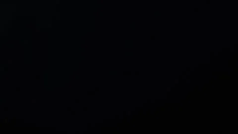 A dramatic display of lightning lights up the night sky Stock Footage 297252492