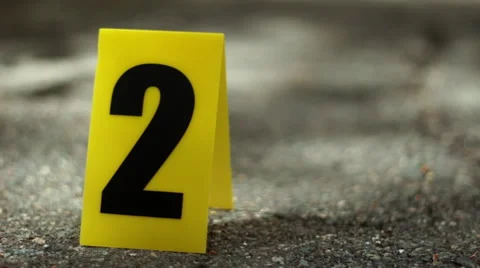 Dramatic Dolly Shot - Crime Scene Yellow Evidence Marker Closeup Vidéo 53200921
