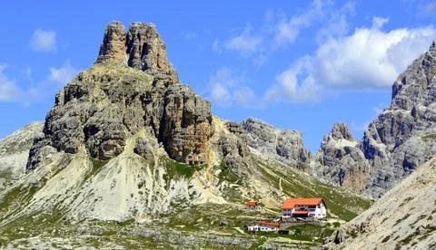 Dramatic Dolomite Peak Above Mountain Refuge Hut Stock Photos
