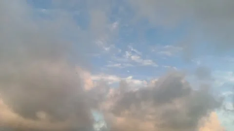 Dramatic Dramatic Clouds in the Evening Sky with Soft Sunlight Stock Footage 335095927