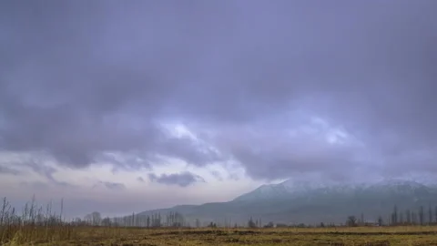 Dramatic dreamy fog and clouds on a cold morning in the mountains. Stock Footage 224127276