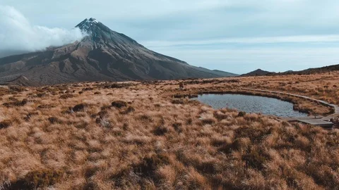 Dramatic drone aerial footage of Mount Taranaki Egmont National Park Stock Footage 107074751