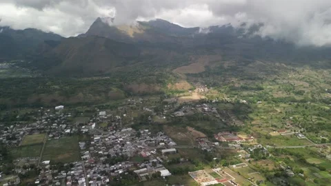 Dramatic drone aerial view of Sembalun Valley's ancient volcanic caldera ne.. Stock-Footage 346753953