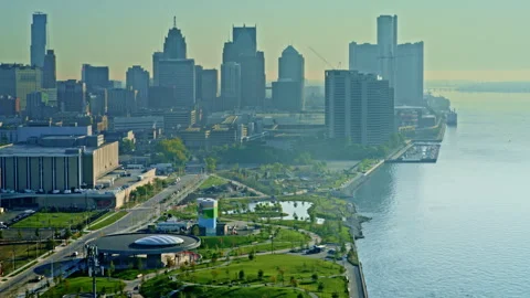 Dramatic drone footage over Detroit River, showing freighter cutting across the Stock Footage 319829114