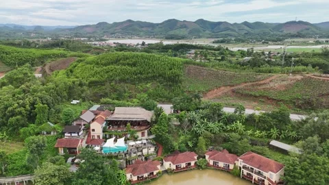 Dramatic drone footage of Quang Binh highlands and lake resort Stock Footage 313664770