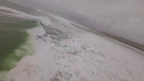 Dramatic drone footage shows turbulent sea with powerful waves Stock Footage 345051138