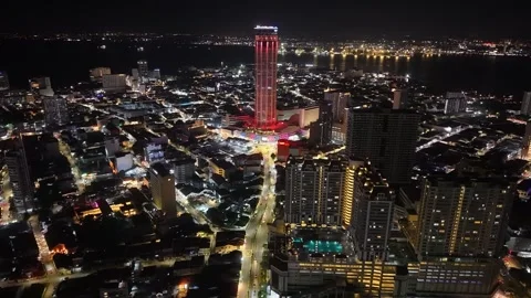 A dramatic drone night view of the illuminated KOMTAR tower 스톡 동영상 332086882