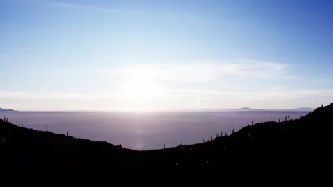 Dramatic Drone Reveal of Sunset Over Uyuni Salt Flats Hills Stock Footage 311128093