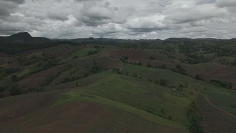 Dramatic Drone Shot of Layered Mountain Range Under Expansive Monsoon Cloud.. Stock-Footage 337393558