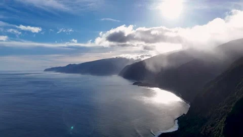 Dramatic Drone View Over Ribeira da Janela, with Sun Rays Cutting Through the Stock Footage 304688857