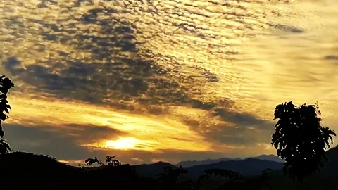 Dramatic Dusk Clouds Drift Over Dark Landscape SKY 4K Video stock 82137628