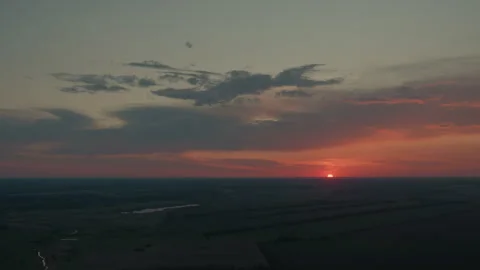 Dramatic dusk clouds over farmland horizon Stock Footage 317168148