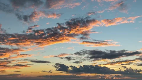 Dramatic dusk sky sunset timelapse through flowing cloud wave, 4K time lapse Stock Footage 245287931