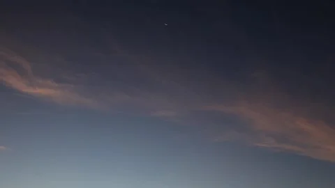 Dramatic Dusk Sky Timelapse with Thin Cirrus Clouds and Crescent Moon Stock Footage 321906283