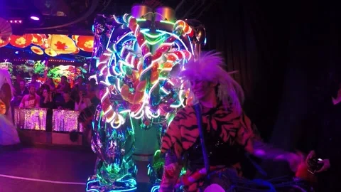 Dramatic &amp; Electric Robot Restaurant Show.  Electric carnival with Robots Stockbeeldmateriaal 148748237