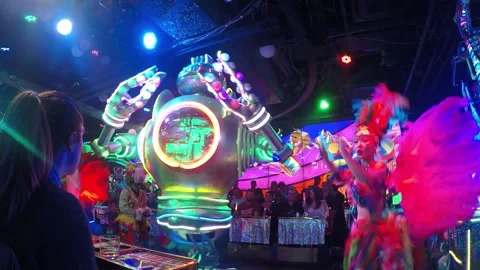 Dramatic &amp; Electric Robot Restaurant Show.  Electric carnival with Robots Stockbeeldmateriaal 149322277