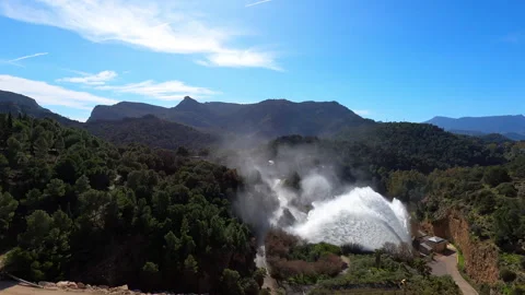 Dramatic emergency water release cascading from a reservoir Stock Footage 331630801