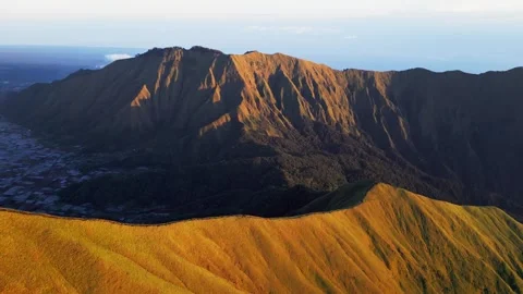 Dramatic Erosion Channels Across Pergasingan Hill Above Forested Valleys in Stock Footage 336704428