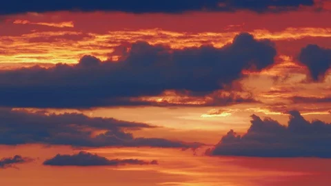 Dramatic evening clouds floating in fire sky, epic orange sunset Stock Footage 120505000