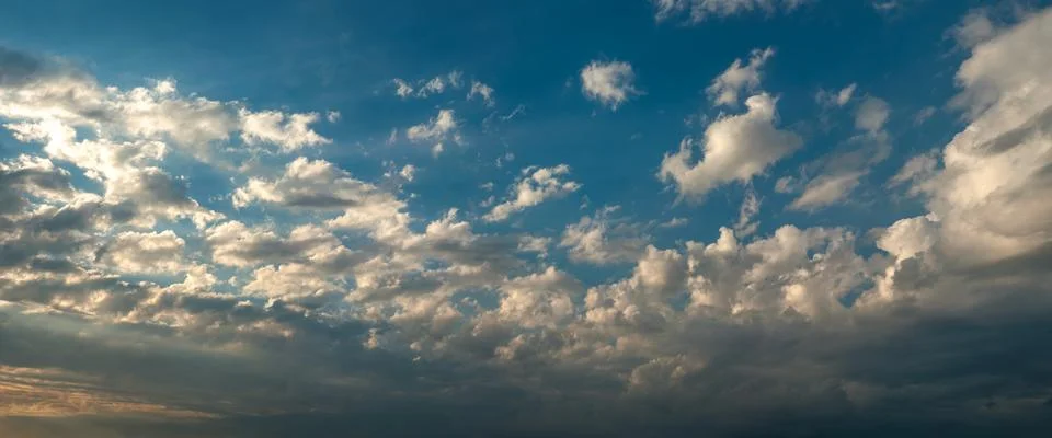 Dramatic evening clouds over the horizon Stock Photos