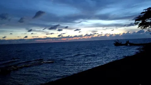 Dramatic Evening Cloudy Sky Over the Meghna River in Bangladesh with Boat Stock Footage 342341684