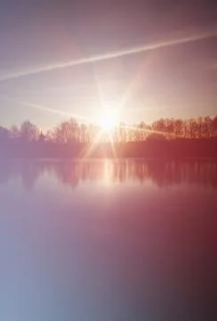 Dramatic evening light leak on the river bank Foto stock