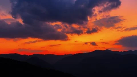 Dramatic Evening Sky Background with Mountain Layers Stock Footage 334840502