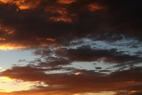 Dramatic Evening Sky with Colourful Cloud Layers Stock Photos