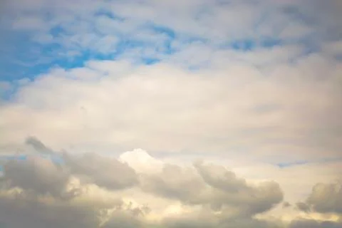 Dramatic evening twilight with clouds and hidden sunset Stock Photos