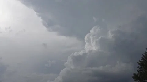 Dramatic expansion of dark cumulonimbus clouds timelapse Stock Footage 159074021